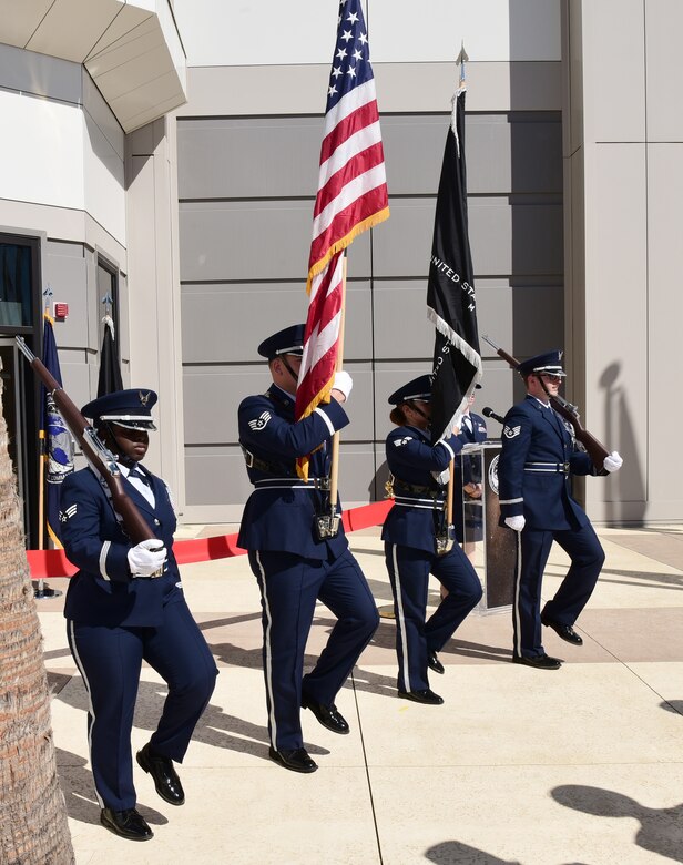 The Vandenberg Honor Guard marches past guests.