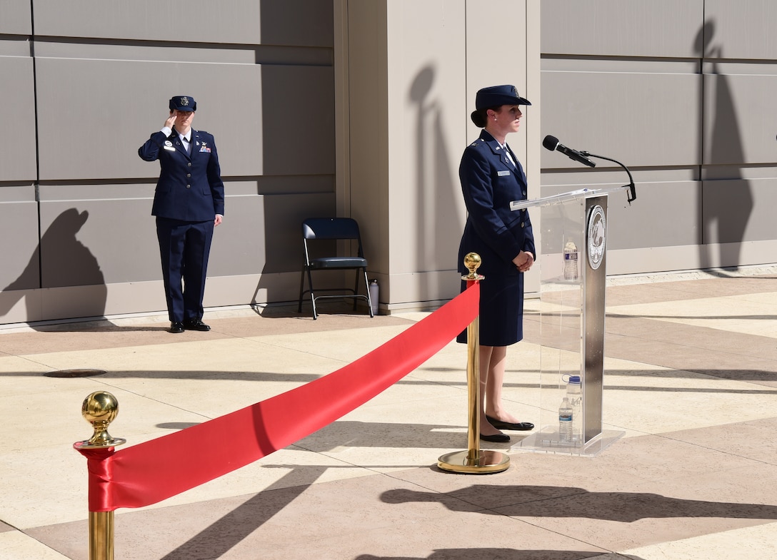 Major General DeAnna Burt, Combined Force Space Component Command commander, welcomes guests at the ribbon-cutting ceremony.