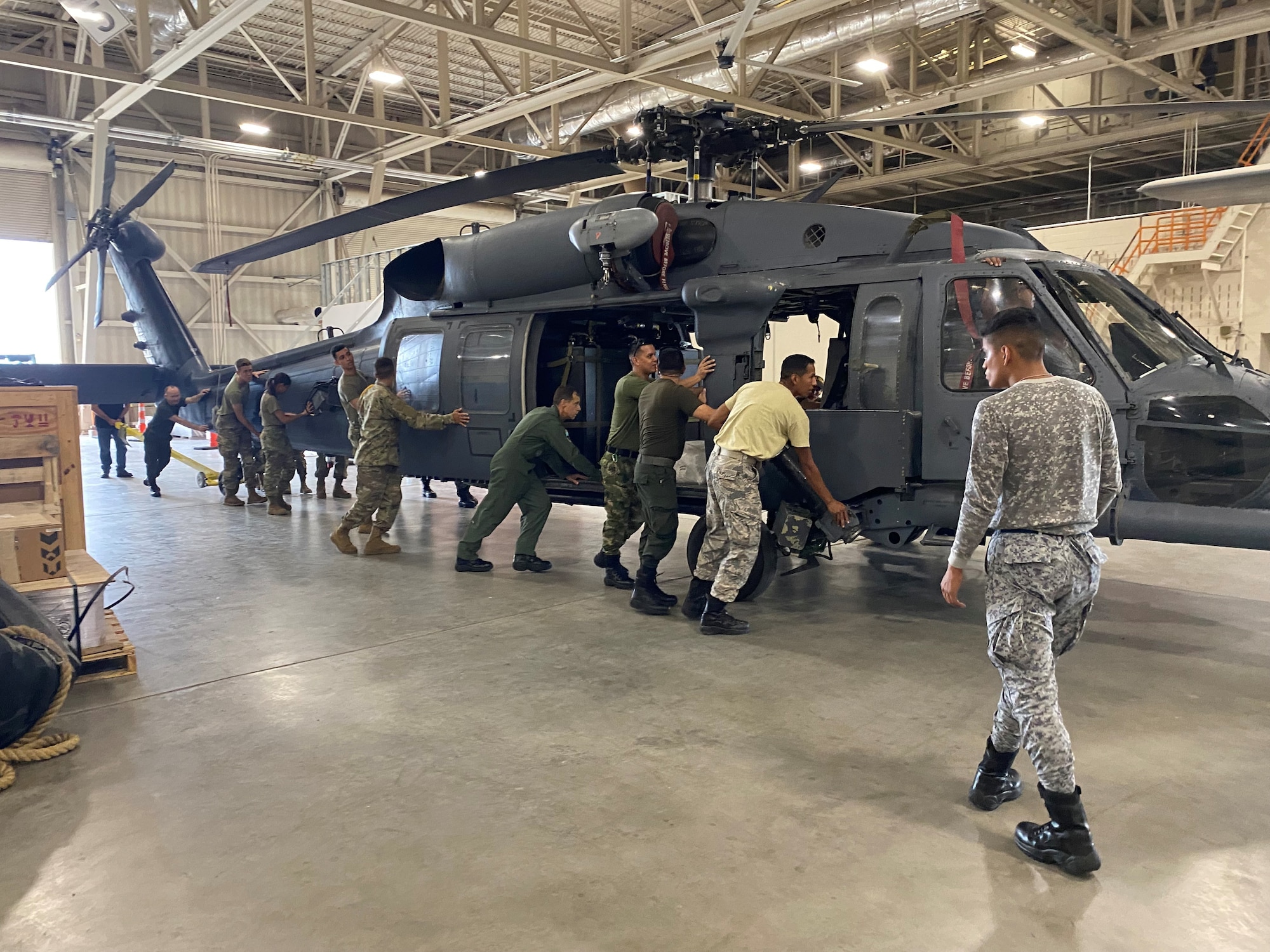 IAAFA instructors work on helicopter