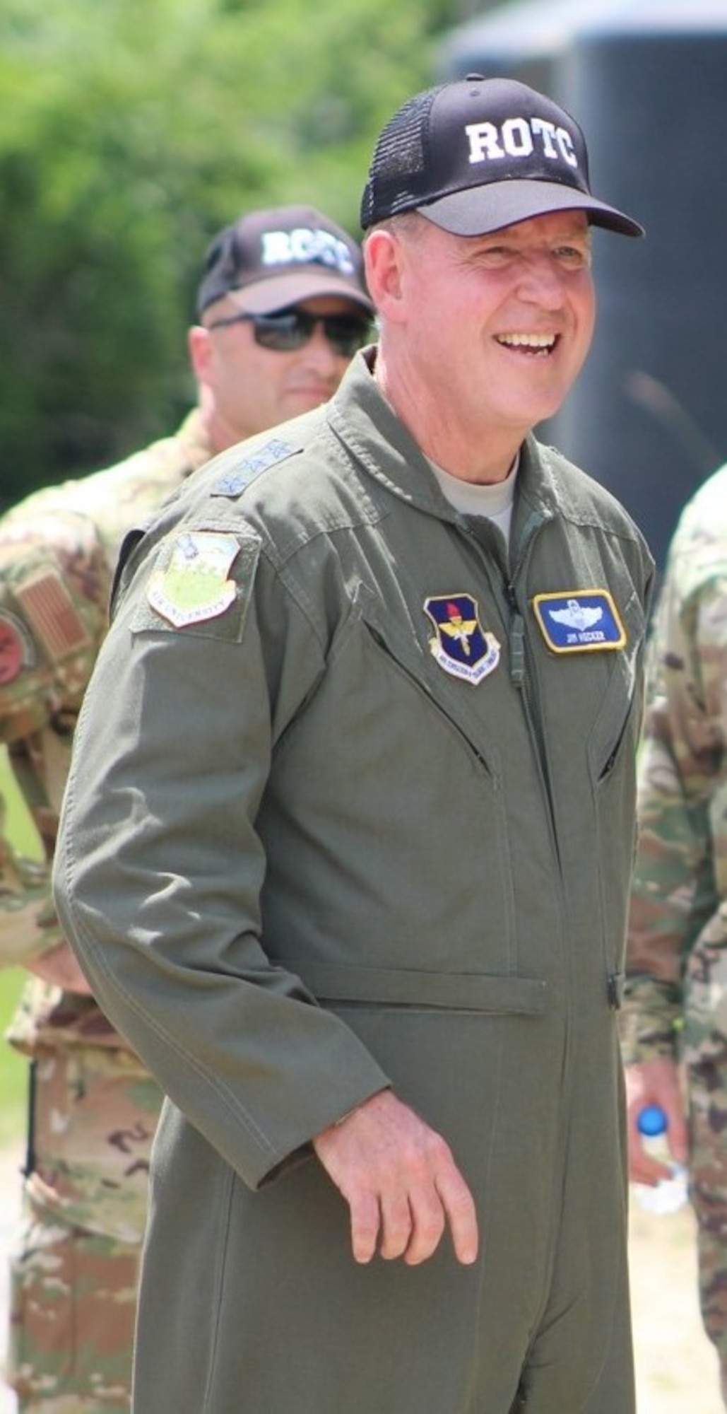 Lt. Gen. Hecker smiles while talking to cadets.