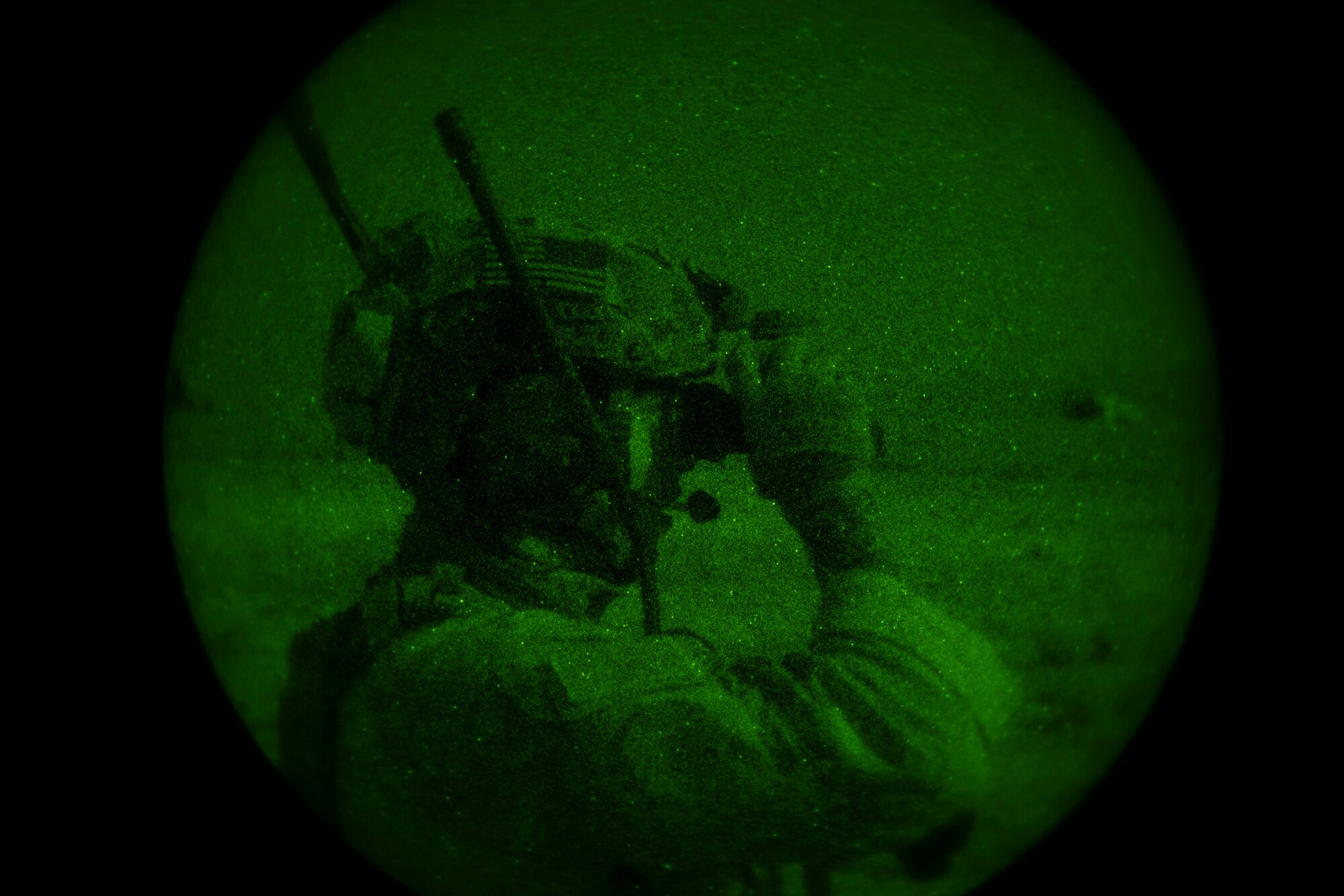A Tactical Air Control Party Cadre member observes Zia Sun participants during an exercise scenario, July 20, 2021 on White Sands Missile Range, New Mexico. The exercise incorporated nighttime scenarios allowing TACP Airmen to train and communicate with aircrafts under lowlight conditions. (U.S. Air Force photo by Airman 1st Class Adrian Salazar)