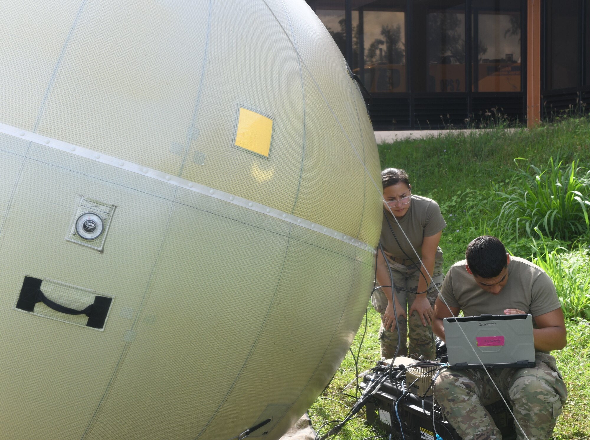 Airmen from the 644th Combat Communications Squadron, Andersen Air Force Base, Guam, set up network satellite communications through a Ground Antenna Transmit and Receive at Tinian International Airport, Tinian, during Pacific Iron 2021, July 26, 2021. Approximately 800 Airmen and 35 aircraft are participating in Pacific Air Forces’ dynamic force employment operation July 11 to Aug. 8, 2021, in Guam and Tinian to project forces into the U.S. Indo-Pacific Command’s area of responsibility in support of the 2018 National Defense Strategy, calling on the military to be a more lethal, adaptive and resilient force. (U.S. Air Force photo by Tech. Sgt. Benjamin Sutton)