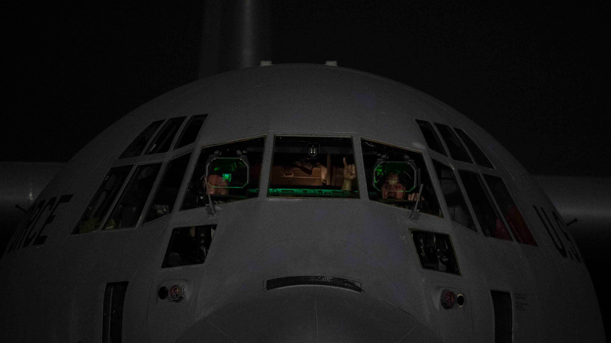 Two pilots assigned to the 36th Airlift Squadron prepare a C-130J Super Hercules for takeoff during Exercise Forager 21 at Yokota Air Base, Japan, July 29, 2021.
