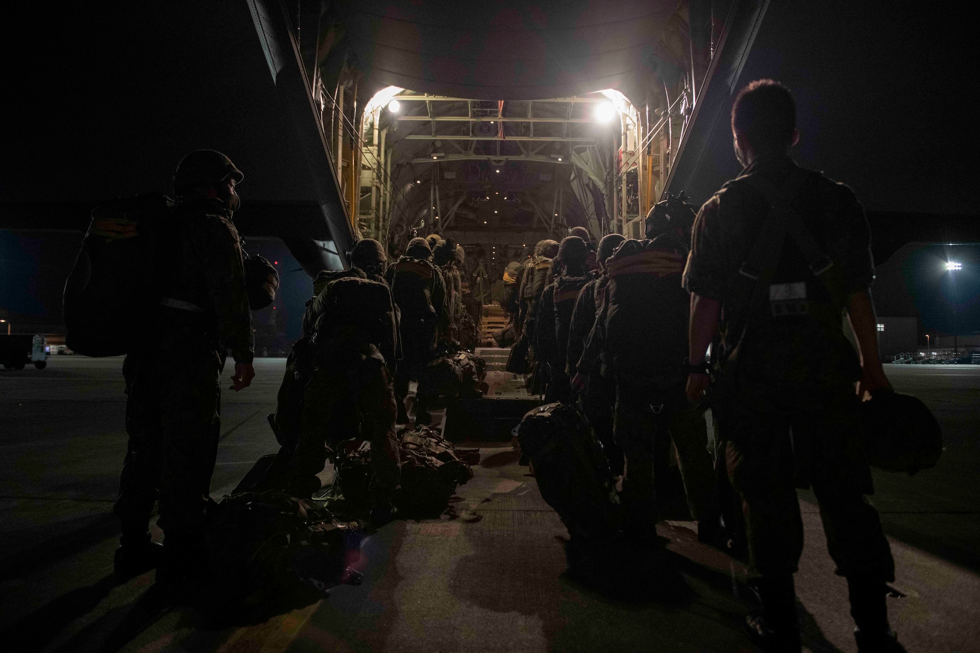 Japan Ground Self-Defense Force soldiers with the 1st Airborne Brigade board a C-130J Super Hercules assigned to the 36th Airlift Squadron during Exercise Forager 21 at Yokota Air Base, Japan, July 29, 2021.