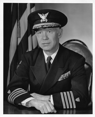 Official photo of Capt. Charles Ward “Tommy” Thomas, who  patrolled cutters on the top of the world, on the bottom of the world, while also studying the contents of the world. U.S. Coast Guard photo.