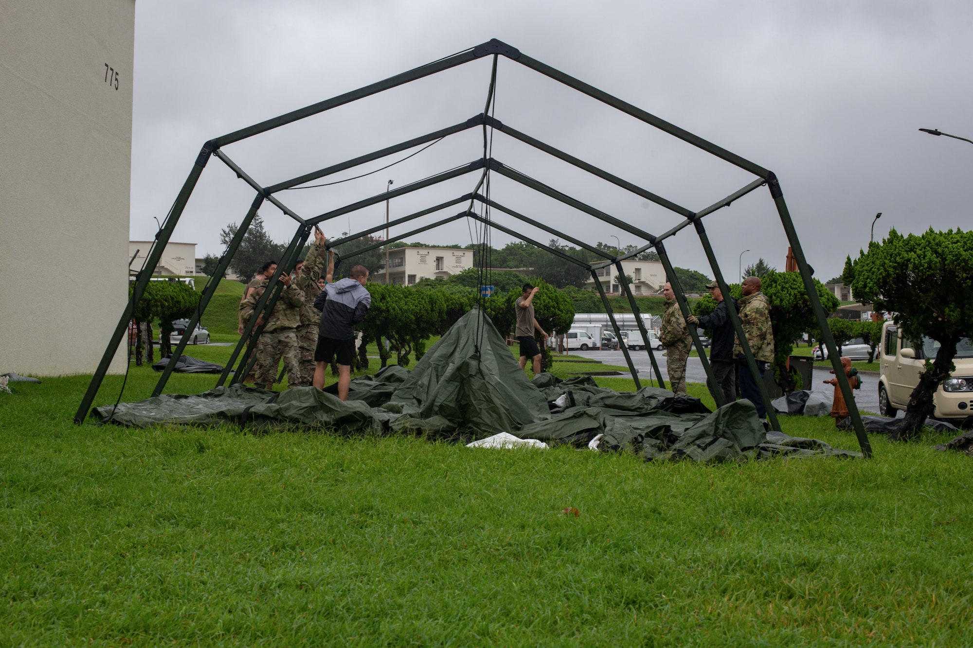 Airmen set up a tent for a Command and Control center during Pacific Iron.