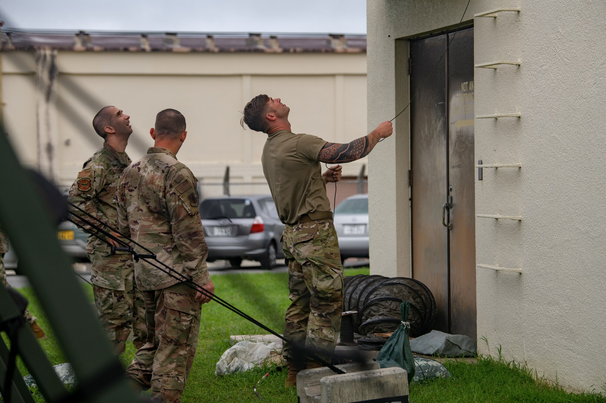 Airmen assist in setting up antennas for communication