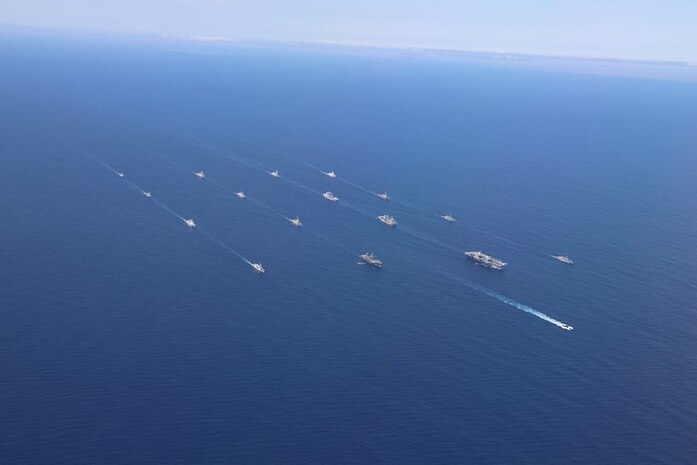 HMS Queen Elizabeth and USS The Sullivans with the United Kingdom Carrier Strike Group joined ships with NATO Standing Maritime Groups One and Two for an impressive display of maritime power in the Eastern Atlantic on 28 May 2021.