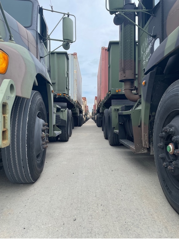 Trucks from the 2113th Transportation Company of the Kentucky National Guard receive loads as apart of Operation Patriot Press during their annual training from June 2-10. The unit safely transported the 625,000 pounds of explosive ordinance between Paducah Ky., the McAlester Army Ammunition Plant (MCAAP) in McAlester, Ok., and the Naval Support Activity (NSA) in Crane, In., during Operation Patriot Press