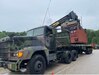 Trucks from the 2113th Transportation Company of the Kentucky National Guard receive loads as apart of Operation Patriot Press during their annual training from June 2-10. The unit safely transported the 625,000 pounds of explosive ordinance between Paducah Ky., the McAlester Army Ammunition Plant (MCAAP) in McAlester, Ok., and the Naval Support Activity (NSA) in Crane, In., during Operation Patriot Press