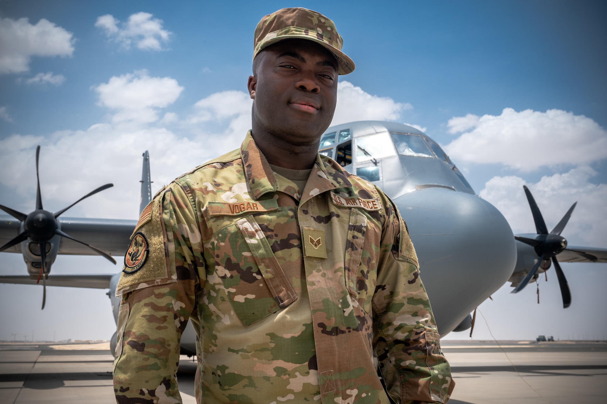 Senior Airman Ajay Vogar, 379th Expeditionary Maintenance Squadron commander support staff security manager, poses for a photo at Al Udeid Air Base, Qatar, July 19, 2021.