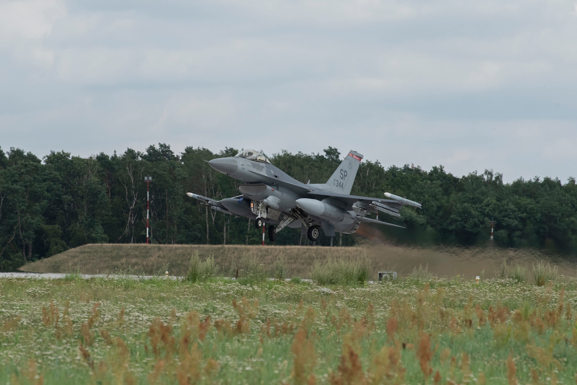 A U.S. Air Force F-16 Fighting Falcon assigned to the 480th Expeditionary Fighter Squadron takes off at Łask Air Base, Poland, August 2, 2021. The 480th EFS is participating in bilateral training with the Polish air force in support of Operation Atlantic Resolve. (U.S. Air Force photo by Tech. Sgt. Anthony Plyler)