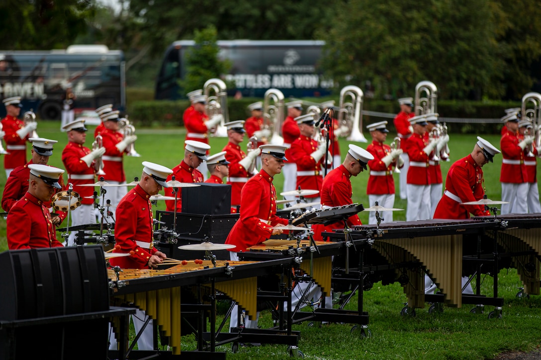 Marines with “The Commandant’s Own,” U.S. Marine Drum and Bugle Corps, perform during the Tuesday Sunset Parade at the Marine Corps War Memorial, Arlington, Va., Aug. 3, 2021. The guest of honor for the evening was Mr. Erik Raven, majority staff director of the Senate Appropriations Committee-Defense, and the hosting official was Brig. Gen. Eric Austin, director, Capabilities Development Directorate. (U.S. Marine Corps photo by Lance Cpl. Mark A. Morales)