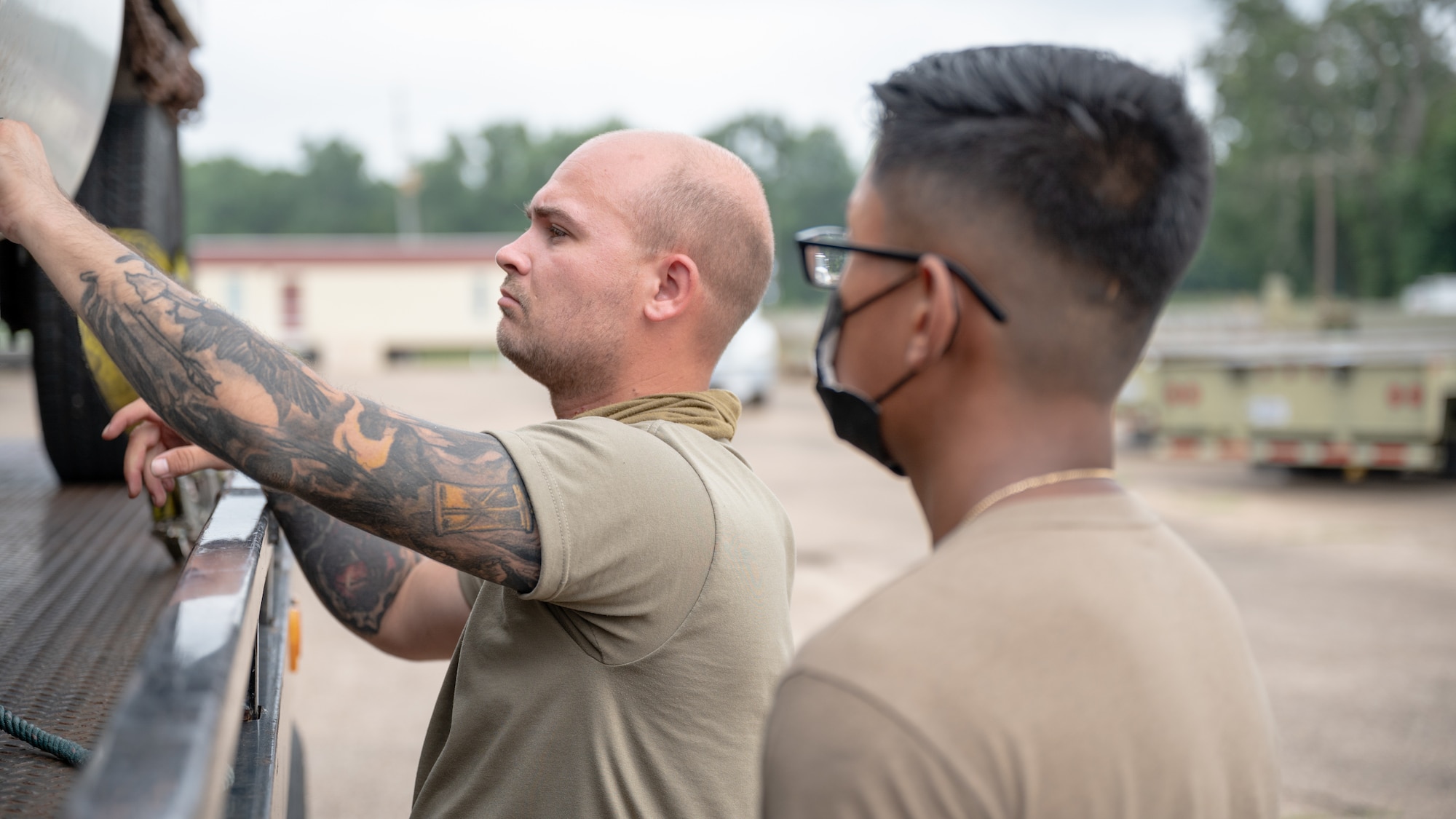 Holloway was training Prak on how to load a disabled vehicle onto a flatbed trailer.