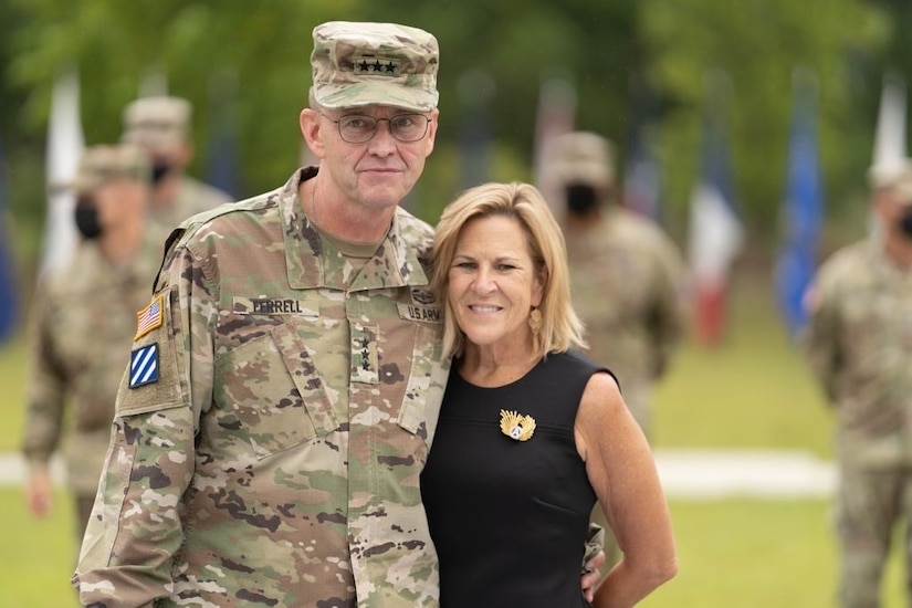 U.S. Army Central's outgoing Commanding General, Lt. Gen. Terry Ferrell, and his wife, Retired Col. Robbie Ferrell, shared messages of gratitude with family, friends, and fellow USARCENT teammates following USARCENT's Change of Command ceremony at Patton Hall's Lucky Park on Shaw Air Force Base, S.C., Aug. 4, 2021. Ferrell assumed command of USARCENT on March 8, 2019, and relinquished USARCENT command to Lt. Gen. Ronald P. Clark before culminating his 38-year career with an afternoon retirement ceremony. (U.S. Army photo by Sgt. Leo Jenkins)