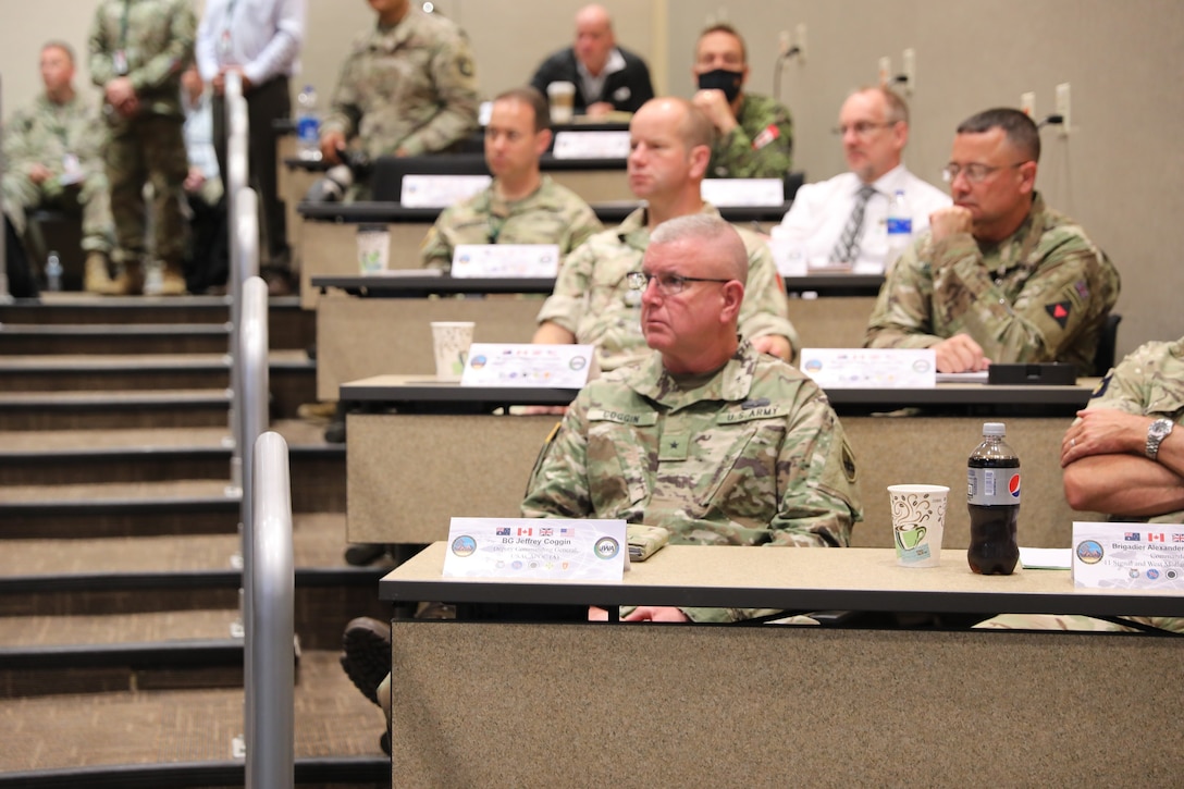 U.S. Army Reserve Brig. Gen. Jeffrey C. Coggin, commanding general of the U.S. Army Civil Affairs and Psychological Operations Command (Airborne), participates in the Joint Warfighting Assessment 2021 distinguished visitor day initial briefing at Fort Carson, Colo., June 25, 2021. USACAPOC(A) Civil Affairs, Psychological Operations, and Information Operations Soldiers took part in JWA 2021 with participants from different Army units and multinational partners such as U.K., Australian and Canadian armed forces, working to improve interoperability between U.S. joint forces and our allies. JWA exercises help the Army evaluate emerging concepts, integrate new technologies, and promote interoperability between the Army, other services, and our multinational partners. Joint and multinational partners are key to the success of Multi-Domain Operations.