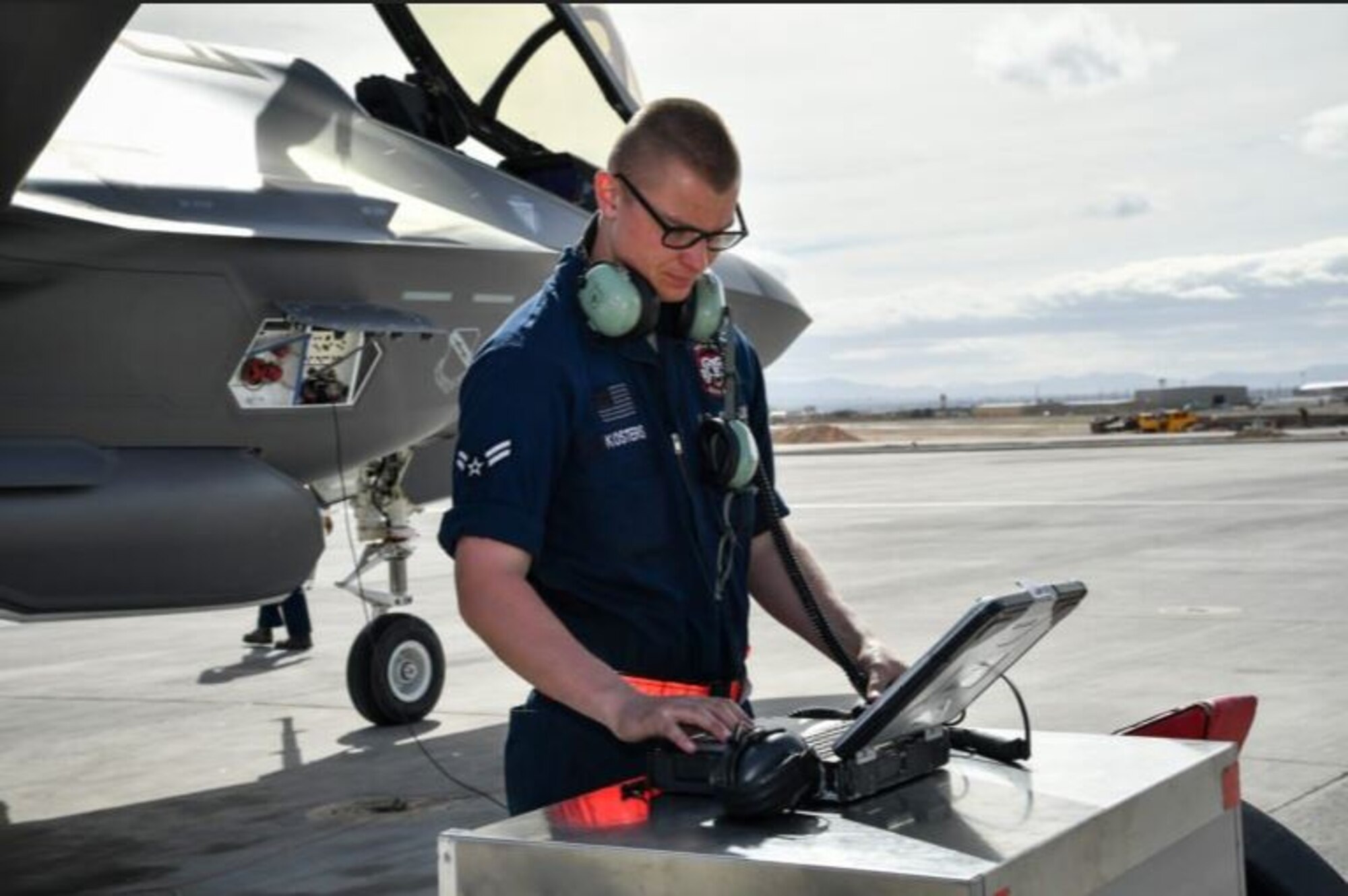 Airman 1st Class Nathan Kosters, a 34th Aircraft Maintenance Unit crew chief, checks computer data while preparing to launch an F-35A Lightning II during Red Flag 17-1 at Nellis Air Force Base, Nevada in Feb. 2017. In order to assist in providing training and best practices in the field of cyber security, the Cyber Resiliency Office for Weapons Systems released an updated version of the Department of the Air Force System Security Engineering Cyber Guidebook July 26th. (U.S. Air Force photo by R. Nial Bradshaw)
