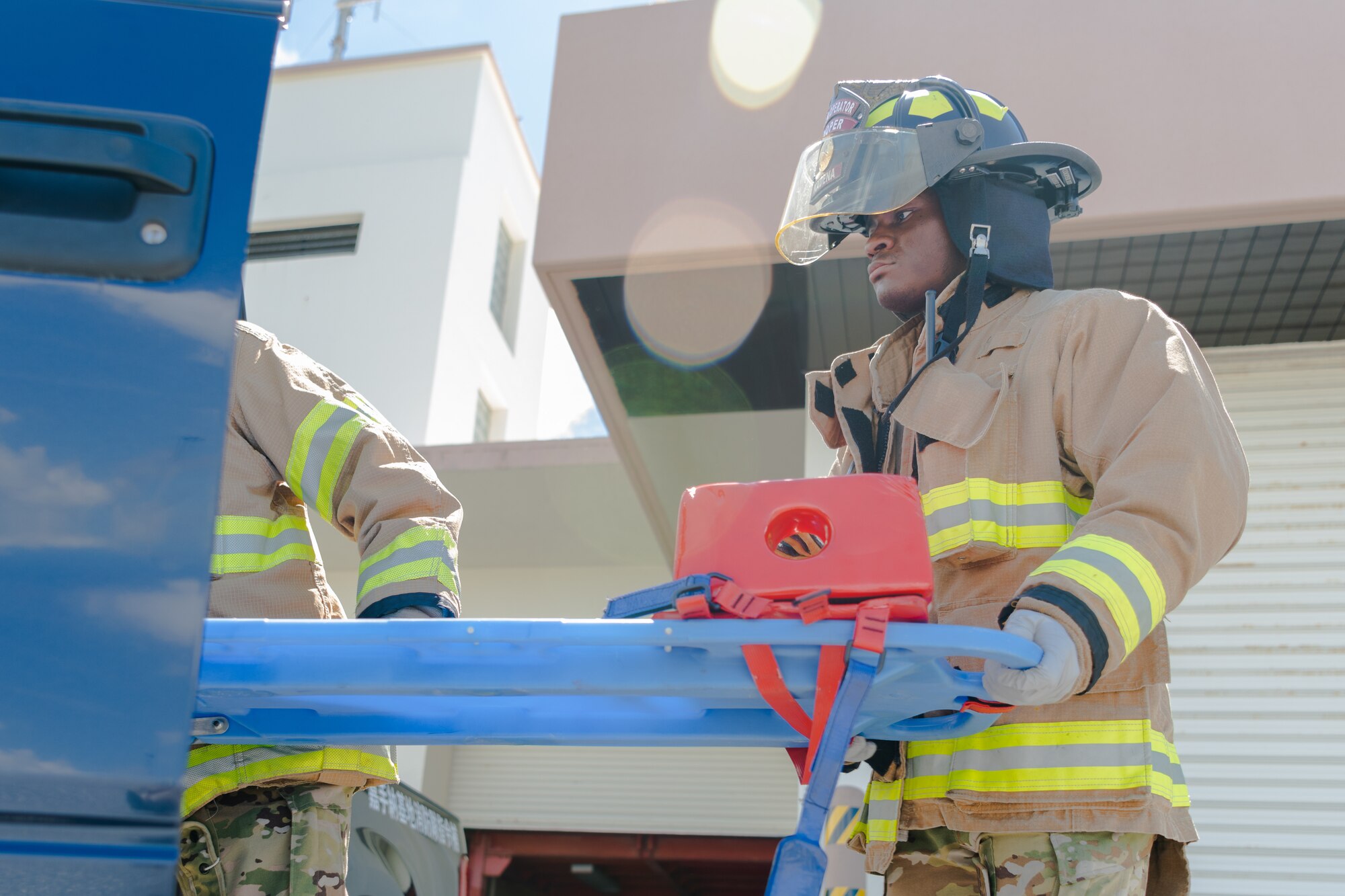 Pictures of the 18th CEF conducting vehicle extrication training on a simulated patient.