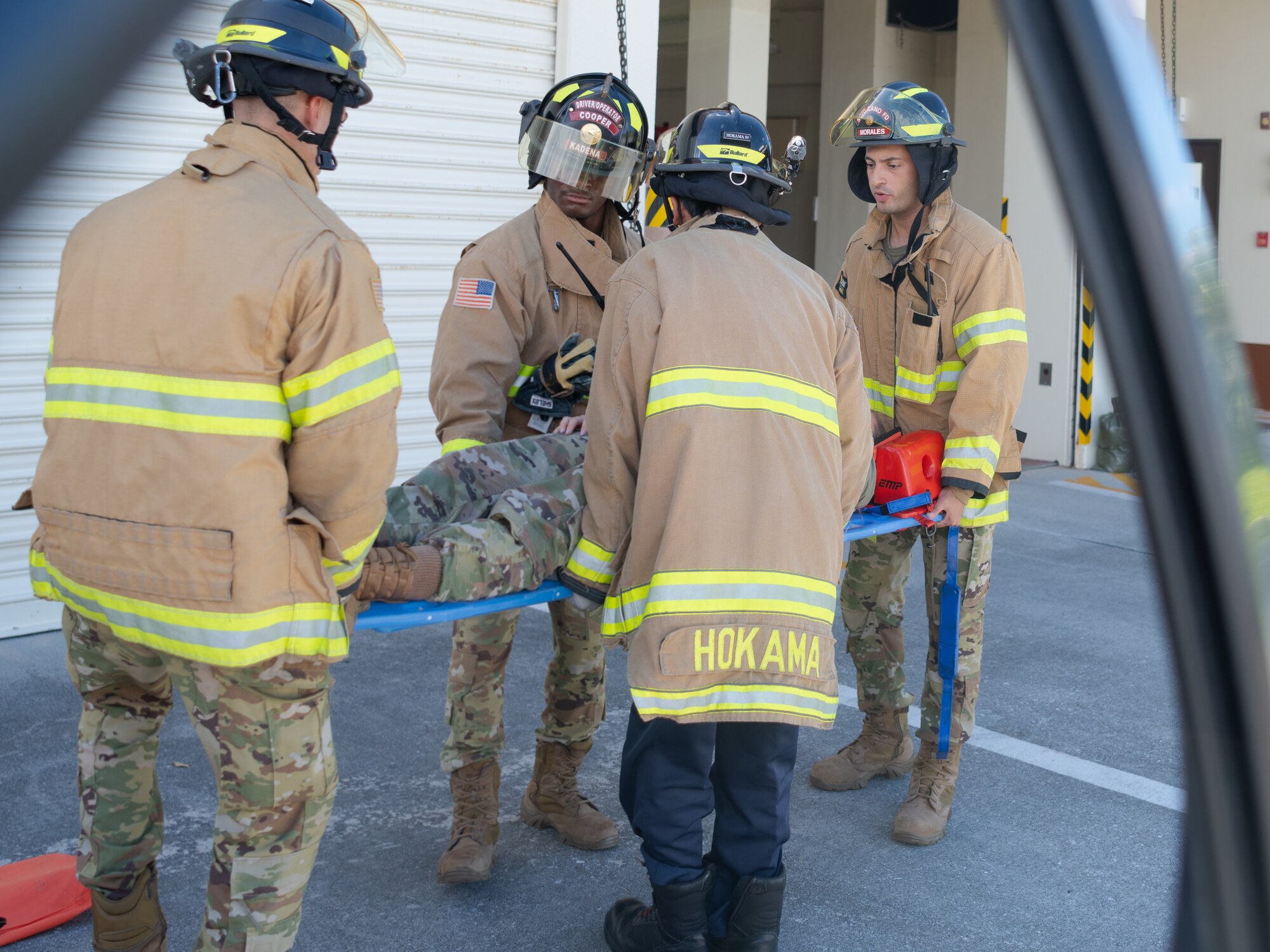 Pictures of the 18th CEF conducting vehicle extrication training on a simulated patient.