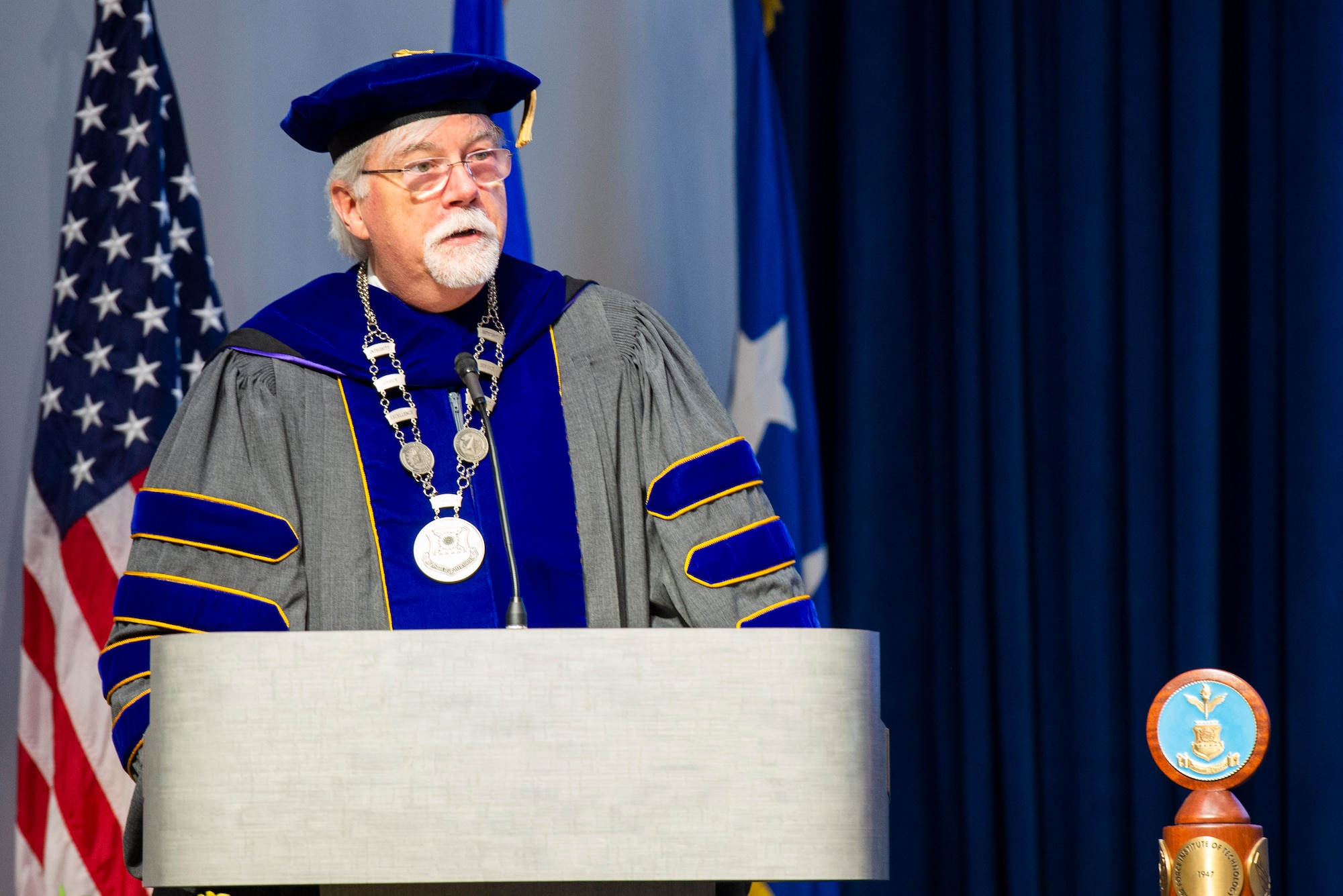 Walter Jones, incoming Air Force Institute of Technology director and chancellor, delivers remarks during an acceptance-of-leadership ceremony July 27 at Wright-Patterson Air Force Base. Jones is the 50th AFIT leader and only the second civilian. (U.S. Air Force photo by Wesley Farnsworth)