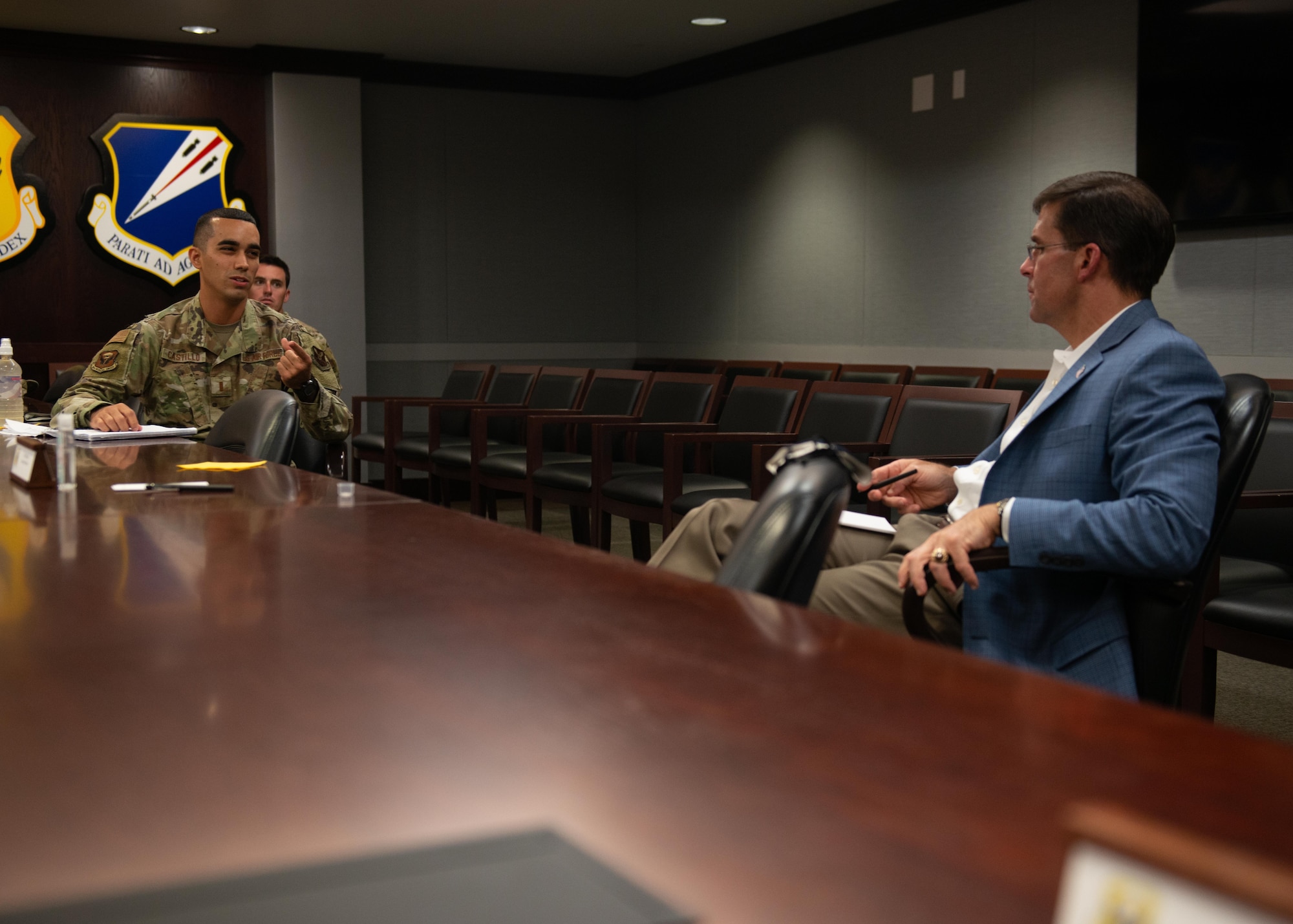 Then-2nd Lt. Nephtali Castillo, 509th Operational Medical Readiness Squadron bioenvironmental engineer, briefs then-Secretary of Defense Dr. Mark T. Esper, during a base visit by the senior defense official to Whiteman Air Force Base, Mo., July 22, 2020. Castillo briefed Esper on his idea of bringing commissioned officer recruiting to his home island of Puerto Rico.