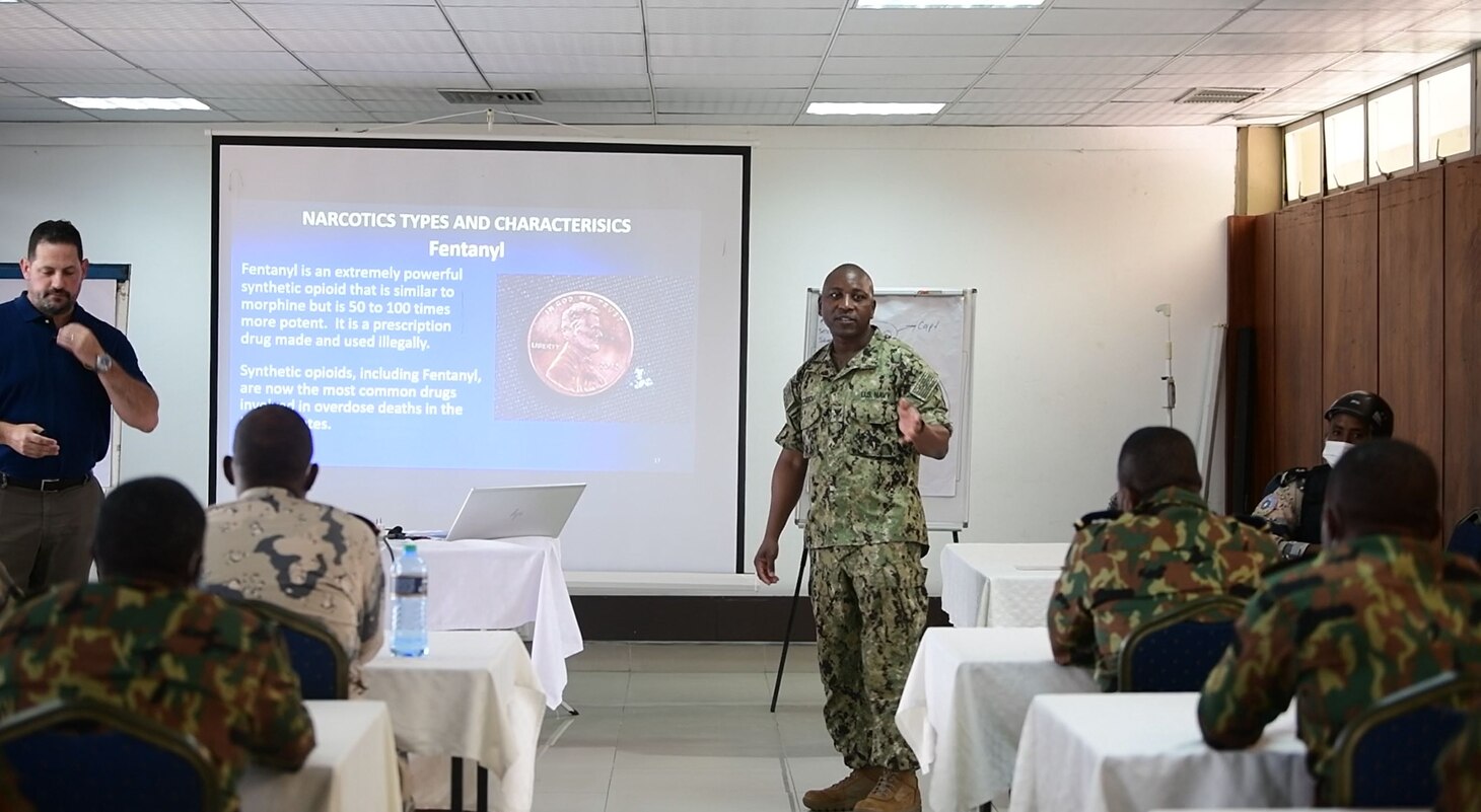 (Aug. 2, 2021) Hospital Corpsman 1st Class Marcelin Aggossou translates during a training evolution as part of Cutlass Express 2021 in East Africa, Aug. 2, 2021. Cutlass Express is designed to improve regional cooperation, maritime domain awareness and information sharing practices to increase capabilities between the U.S., East African and Western Indian Ocean nations to counter illicit maritime activity. (U.S. Navy photo by Mass Communication Specialist 1st Class Ridge Leoni)