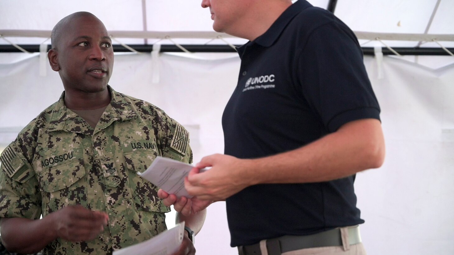 (Aug. 2, 2021) Hospital Corpsman 1st Class Marcelin Aggossou translates during a training evolution as part of Cutlass Express 2021 in East Africa, Aug. 2, 2021. Cutlass Express is designed to improve regional cooperation, maritime domain awareness and information sharing practices to increase capabilities between the U.S., East African and Western Indian Ocean nations to counter illicit maritime activity.