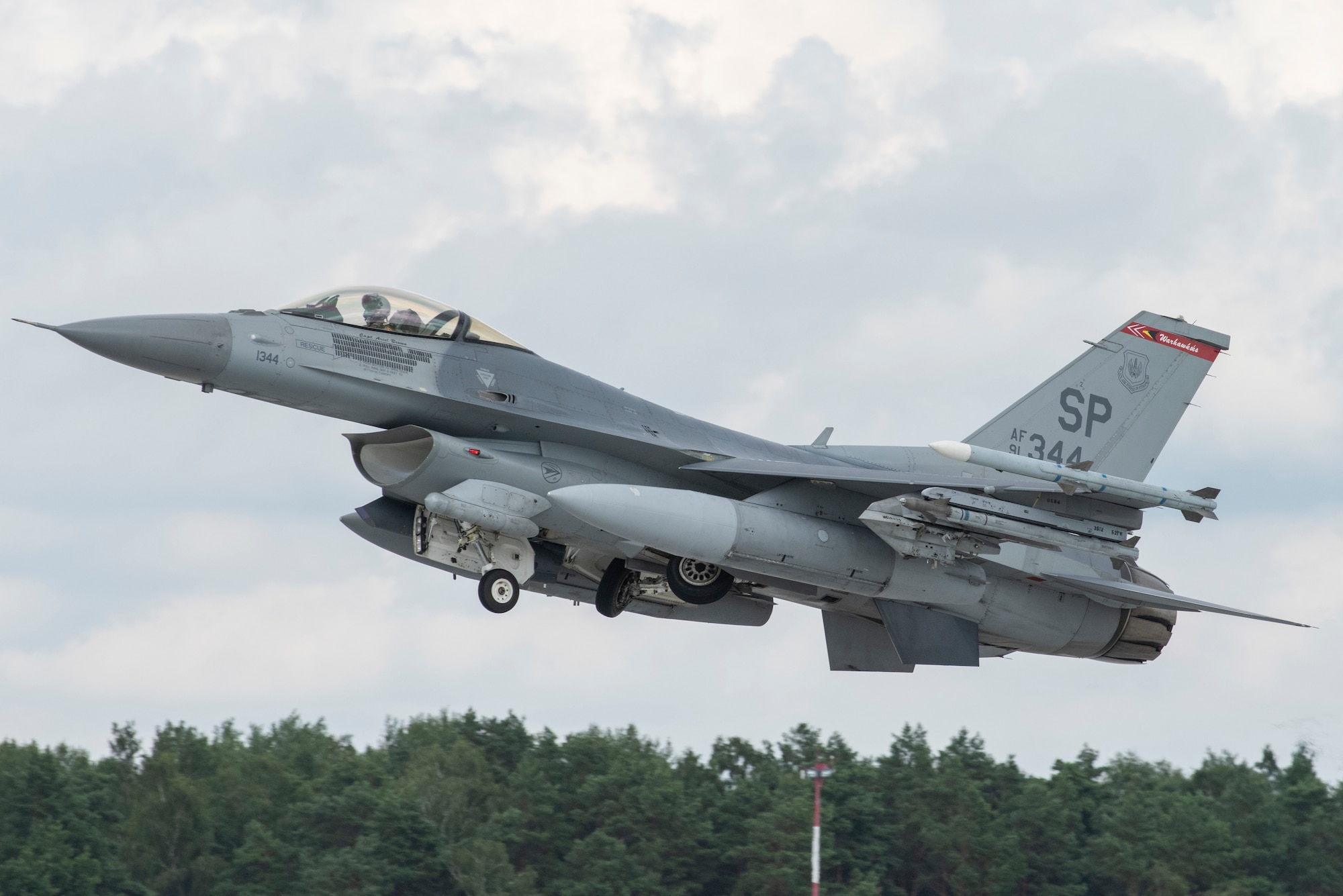 A U.S. Air Force F-16 Fighting Falcon, assigned to the 480th Expeditionary Fighter Squadron, takes off at Łask Air Base, Poland during Aviation Detachment Rotation 21.3, August 2, 2021. The ADR focuses on maintaining joint readiness while enhancing partner interoperability. (U.S. Air Force photo by Tech. Sgt. Anthony Plyler)