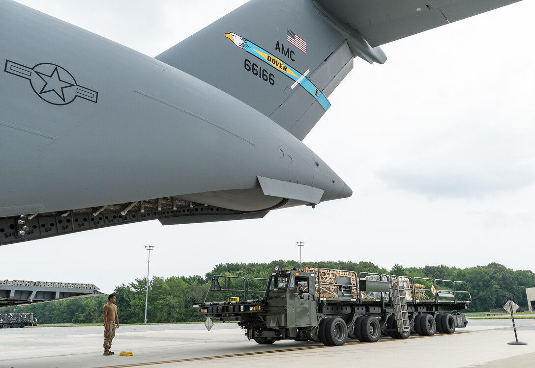 Airmen from the 436th Aerial Port Squadron load pallets onto a C-17 Globemaster III as part of a foreign military sales mission at Dover Air Force Base, Delaware, July 29, 2021. The U.S. and Nigeria have a long-standing partnership.The bilateral relationship is built on several pillars including security cooperation. Nigeria is a key partner in countering violent extremist organizations throughout the Lake Chad Basin. (U.S. Air Force photo by Roland Balik)