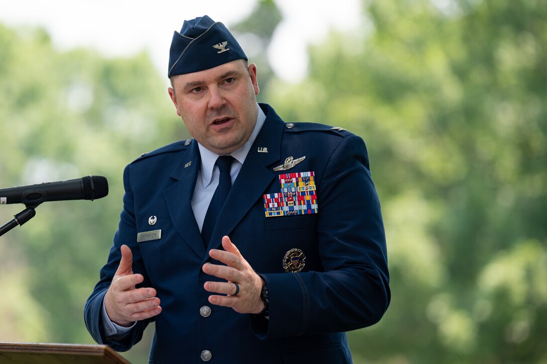Col. Mark Dmytryszyn, 2nd Bomb Wing commander, gives his remarks during the Purser Park Monument unveiling ceremony at Barksdale Air Force Base, Louisiana, July 30, 2021. The monument was memorialized in front of Commander's Square park. (U.S. Air Force photo by Airman 1st Class Jonathan E. Ramos)