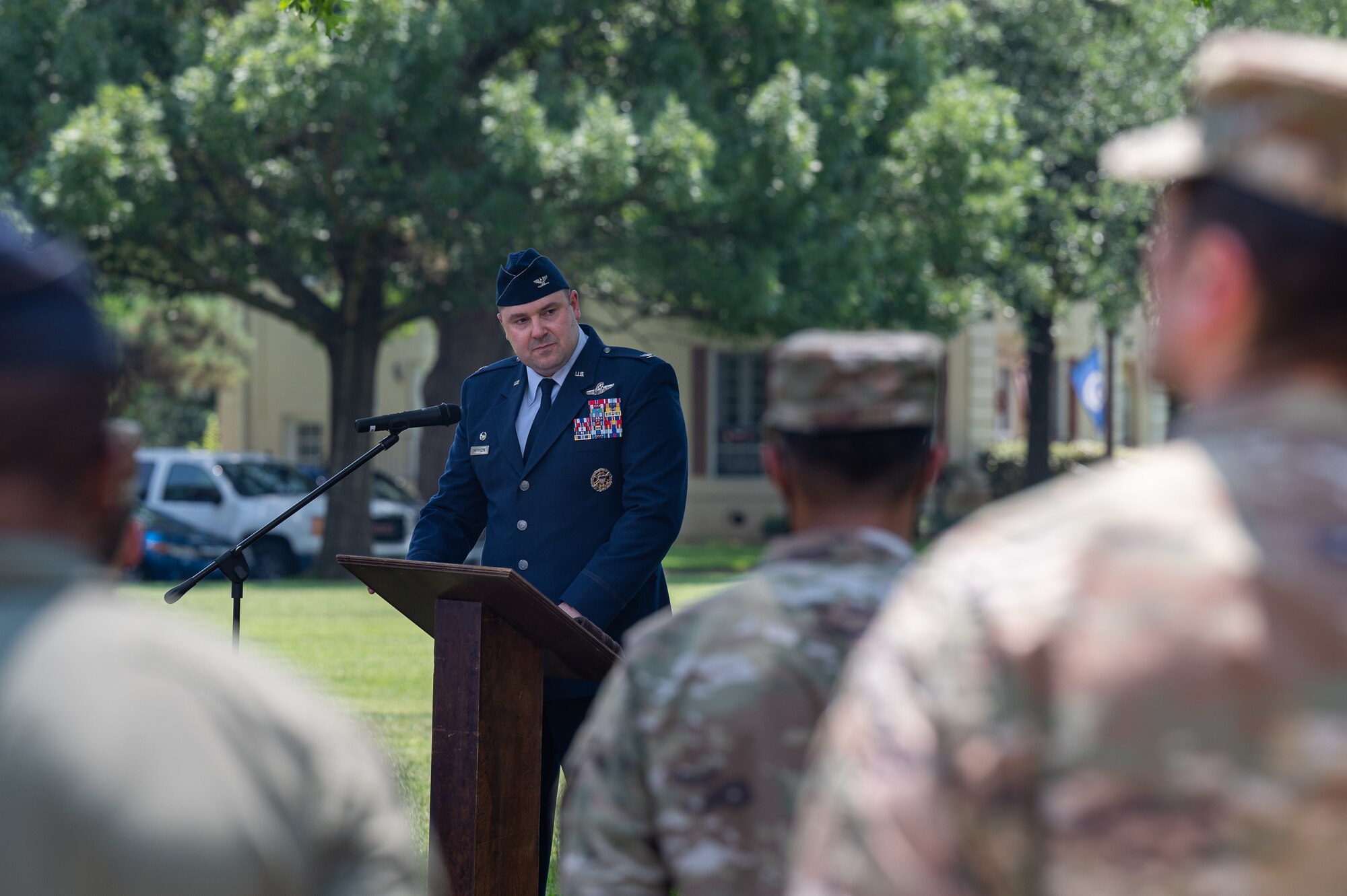 Col. Mark Dmytryszyn, 2nd Bomb Wing commander, gives his remarks during the Purser Park Monument unveiling ceremony at Barksdale Air Force Base, Louisiana, July 30, 2021. The monument was memorialized in front of Commander's Square park. (U.S. Air Force photo by Airman 1st Class Jonathan E. Ramos)