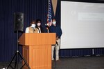 Norfolk Naval Shipyard (NNSY) employees Dickson Aweanung, Candice Pollard and Raymond Pierre III present their capstone projects at the Code 130 Quality Employee Development Program graduation ceremony.
