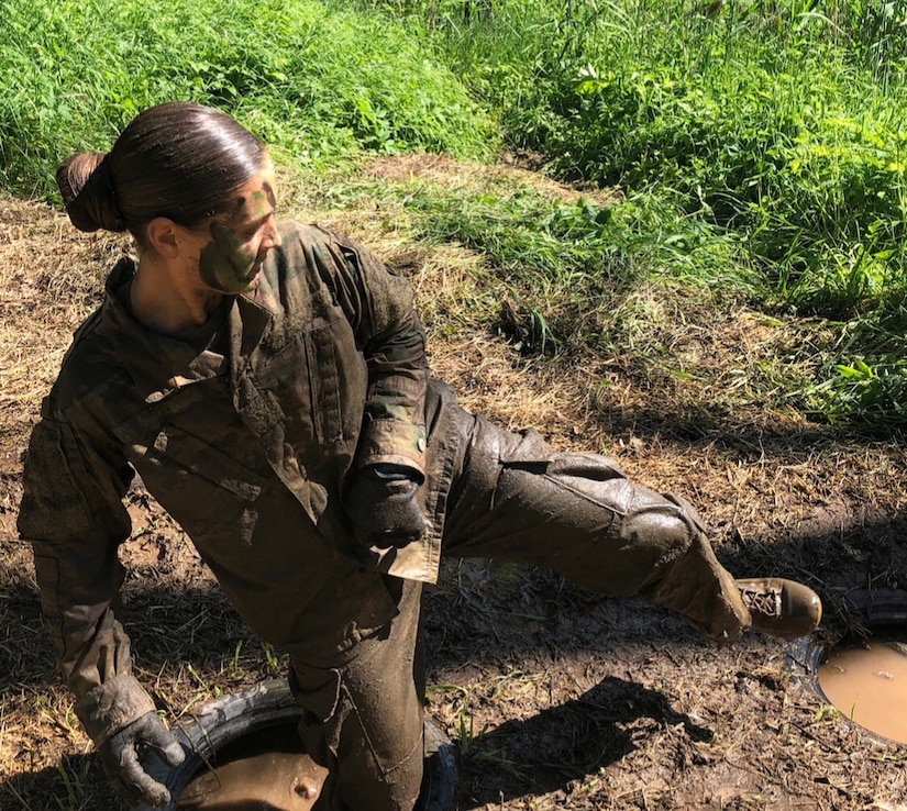 2nd Lt. Meredith Lynn, Platoon Leader for 3rd Platoon, Charlie Company, 1st Battalion, 111th Infantry Regiment, works through an obstacle course in Lithuania during her time as a cadet in Reserve Officers' Training Corps at Indiana University of Pennsylvania. Lynn and the other cadets, at the time, were part of the Cultural Understanding and Leadership Program (U.S. Army courtesy photo).