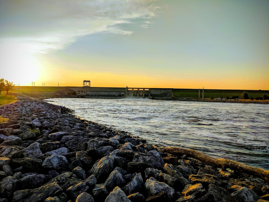Harry S. Truman Dam during a sunset while releasing water during the 2019 flood, which was the highest lake level on record.