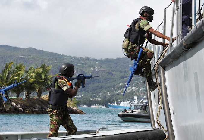 (Aug. 3, 2021) Members of the Seychellois Coast Guard board the Seychellois patrol boat SCGS La Fleche (P32) during visit, board, search, and seizure training as part of exercise Cutlass Express 2021 in Victoria, Seychelles, Aug. 3, 2021. Cutlass Express is designed to improve regional cooperation, maritime domain awareness and information sharing practices to increase capabilities between the U.S., East African and Western Indian Ocean nations to counter illicit maritime activity.