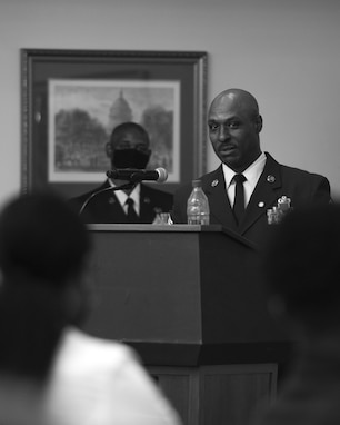 Retired Chief Master Sgt. Kendall Briscoe, 11th Executive for Enlisted Matters to the Assistant Secretary of the Air Force for Financial Management and Comptroller, addresses a crowd during his retirement ceremony at Joint Base Anacostia-Bolling, Washington, D.C., July 30, 2021. Briscoe was joined by more than 100 friends, family members and colleagues for his ceremony, which celebrated his 32 years of service in the Air Force. (U.S. Air Force photo by Staff Sgt. Elora J. McCutcheon)