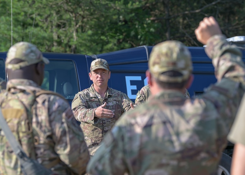 U.S. Air Force Tech. Sgt. Travis Tarr, an Explosive Ordnance Disposal Instructor assigned to Air Force Reserve Command, Dobbins Air Force Base, Georgia, conducts a safety briefing July 25, 2021 during the Audacious Warrior Training Exercise at Fort McCoy, Wisconsin. Audacious Warrior 2021 consisted of 18 different EOD units across the Air National Guard and Air Force Reserve. (U.S. Air National Guard photo by Staff Sgt. Cameron Lewis)