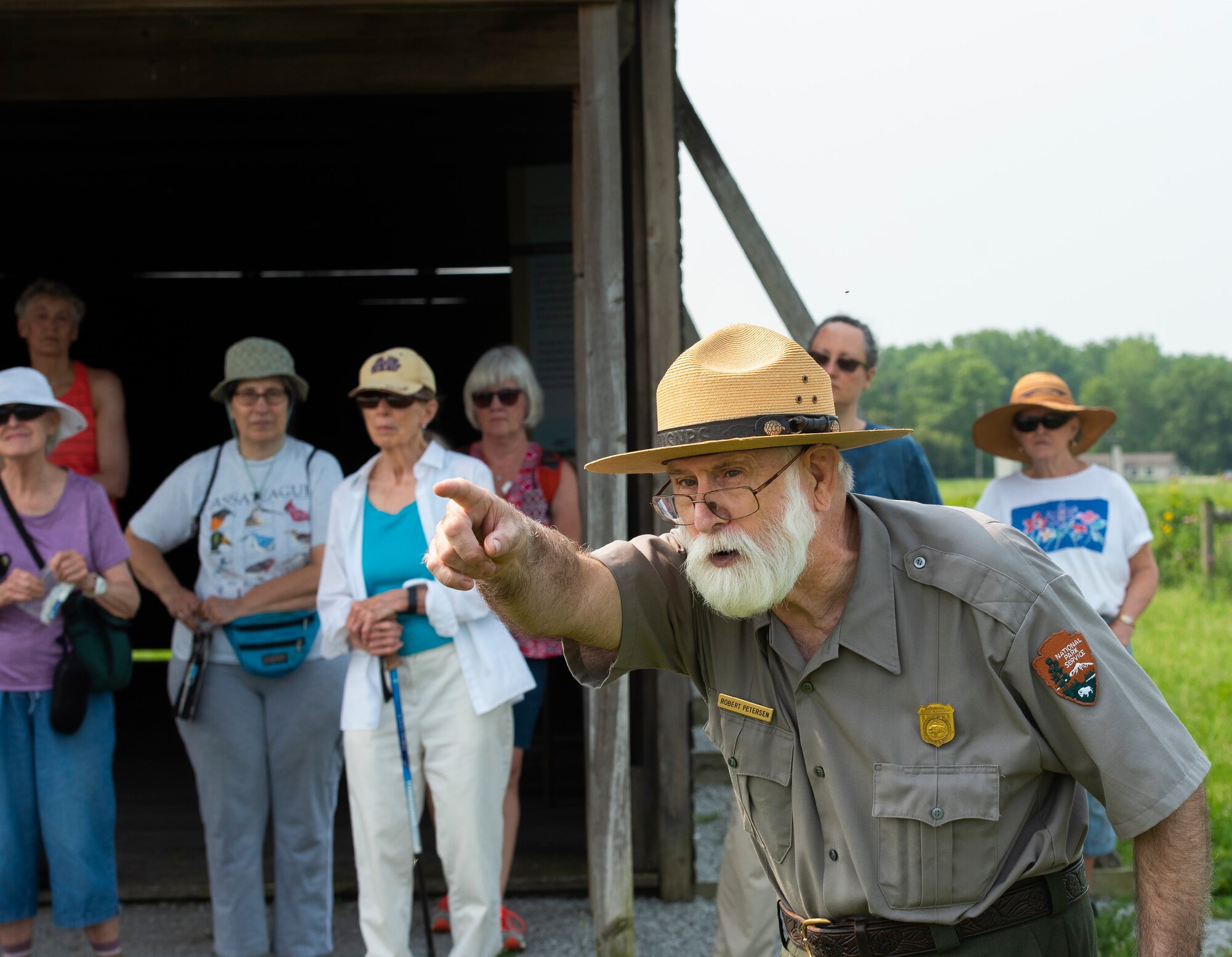 Robert Peterson of the National Park Service talks about
the history of Huffman Prairie at Wright-Patterson Air Force Base on July 19 as visitors take part in a nature walk sponsored by the 88th Civil Engineer Group’s Environmental Branch. Huffman Prairie.