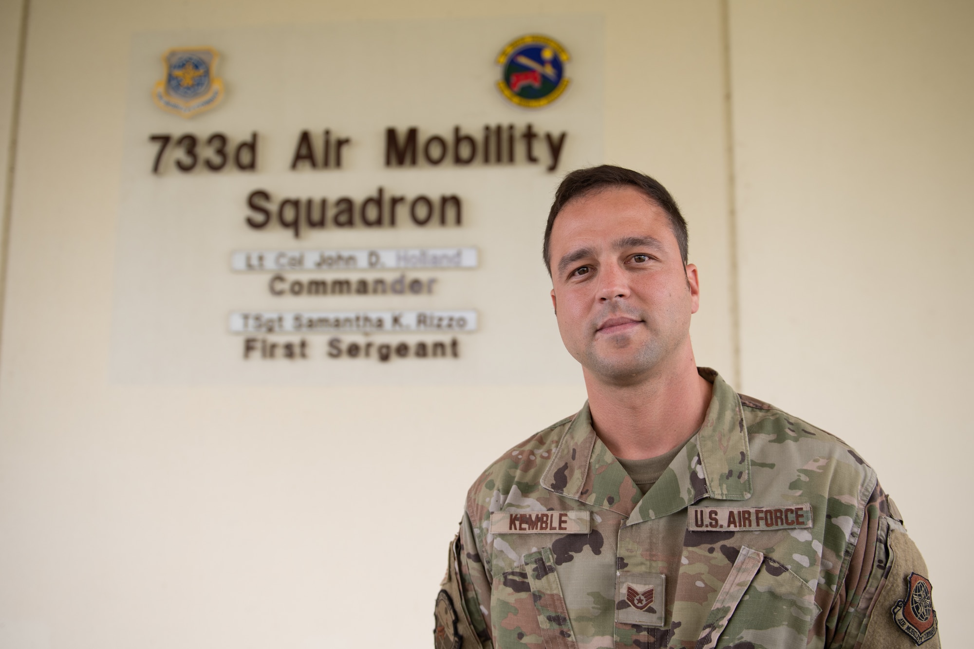 U.S. Air Force Staff Sgt. Kyle Kemble, 733rd Air Mobility Squadron asset evaluator, poses for a photo at Kadena Air Base, Japan, Aug. 4, 2021.