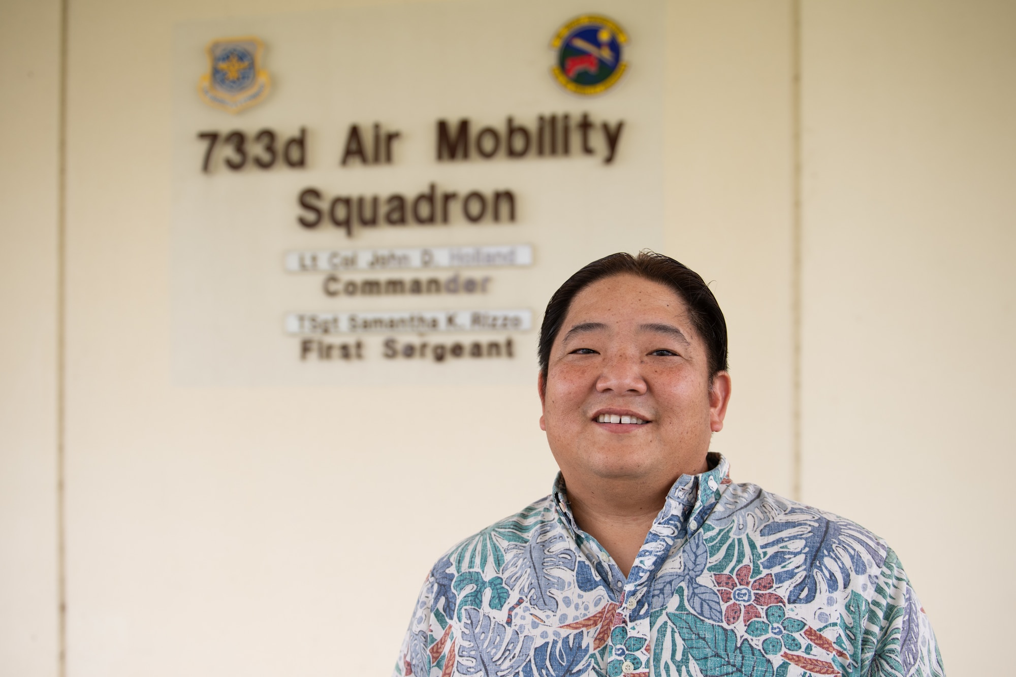 U.S. Air Force GS-11 employee Brandon Yoneda, 733rd Air Mobility Squadron air terminal operations duty officer, poses for a photo at Kadena Air Base, Japan, Aug. 4, 2021.