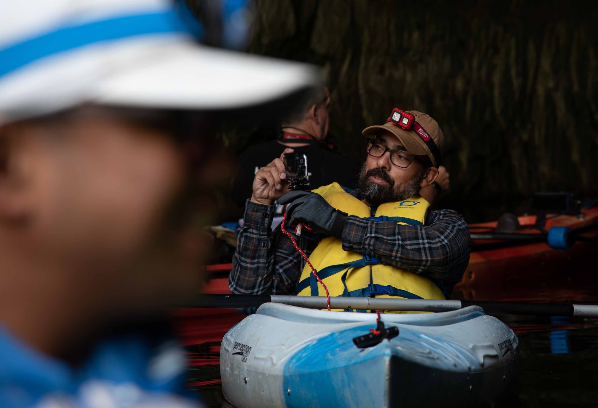 Man on kayak takes photo with gopro