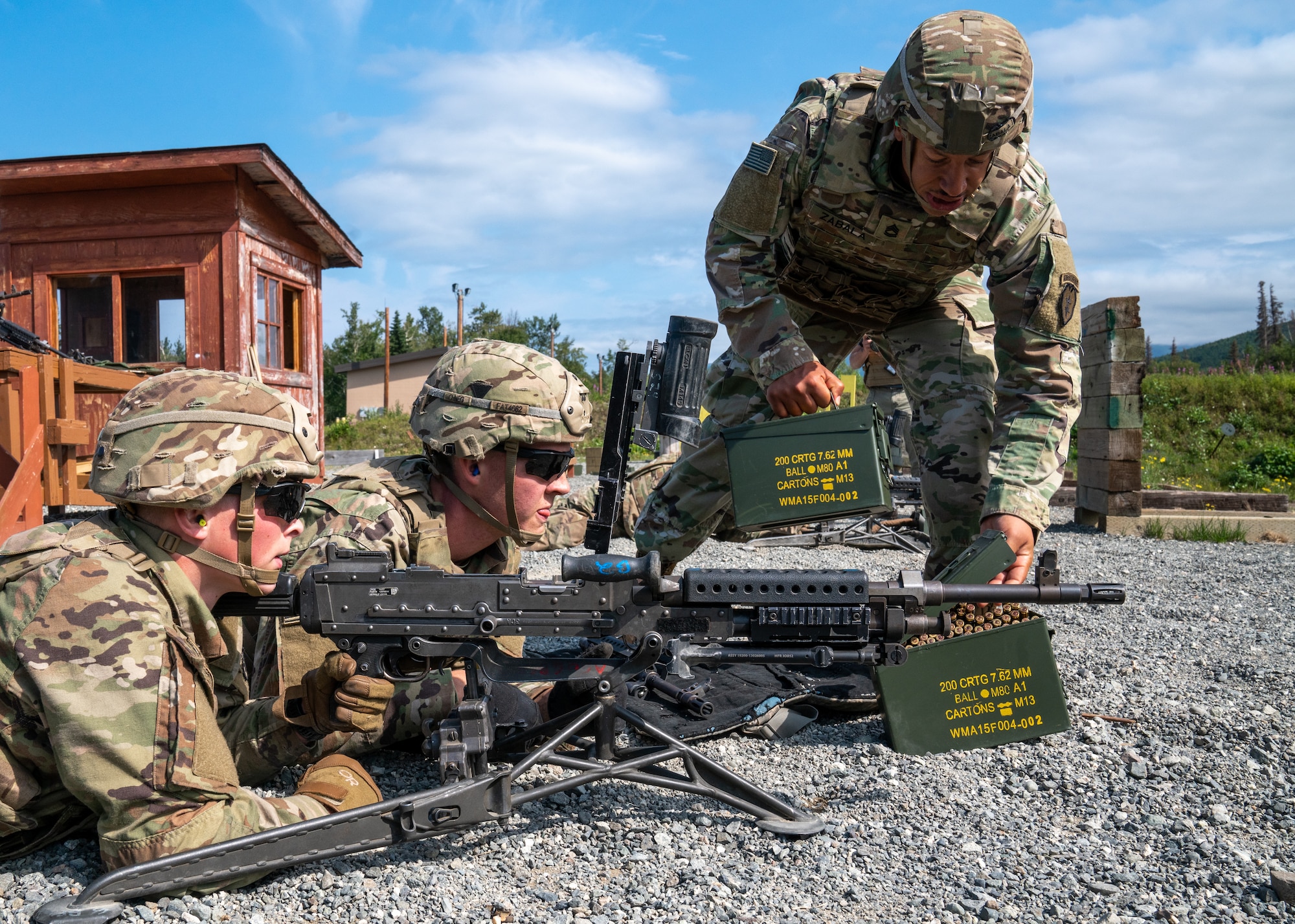 U.S. Army Pvt. Charles Becker, Spc. Trevor Tate, and Sgt. 1st Class Kelvin Zabala, combat engineers assigned to the 6th Brigade Engineer Battalion (Airborne), 4th Infantry Brigade Combat Team (Airborne), 25th Infantry Division, U.S. Army Alaska, prepare to conduct live-fire training.