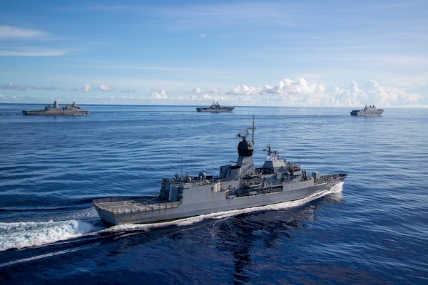 Amphibious assault ship USS America (LHA 6), steams alongside Royal Australian Navy (RAN) Canberra-class landing helicopter dock ship HMAS Canberra (L02), Antonio-class amphibious transport dock USS New Orleans (LPD 18), Japan Maritime Self Defense Force Takanami-class destroyer JS Makinami (DD 112) and RAN Anzac-class frigate HMAS Ballarat (FFH 155) conduct maritime maneuvers during the U.S.-led Large Scale Global Exercise 21. LSGE 21 is global command and control exercise, with a regional focus, to enhance integration of the U.S., allies and partners in the Indo-Pacific region.