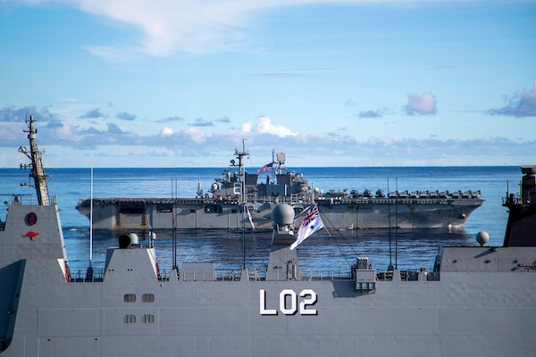 Amphibious assault ship USS America (LHA 6), steams alongside Royal Australian Navy (RAN) Canberra-class landing helicopter dock ship HMAS Canberra (L02), Antonio-class amphibious transport dock USS New Orleans (LPD 18), Japan Maritime Self Defense Force Takanami-class destroyer JS Makinami (DD 112) and RAN Anzac-class frigate HMAS Ballarat (FFH 155) conduct maritime maneuvers during the U.S.-led Large Scale Global Exercise 21. LSGE 21 is global command and control exercise, with a regional focus, to enhance integration of the U.S., allies and partners in the Indo-Pacific region.