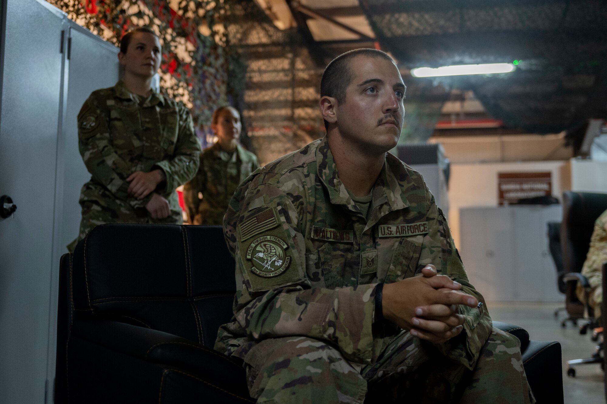 Airman sitting down