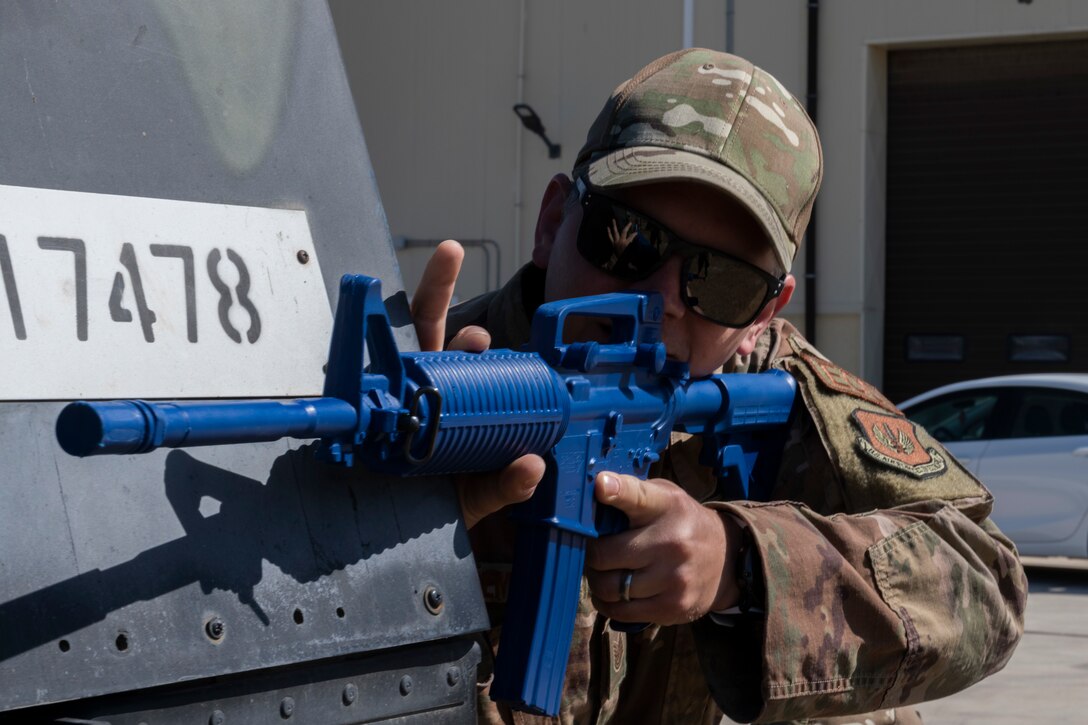 Airmen training with dummy weapons