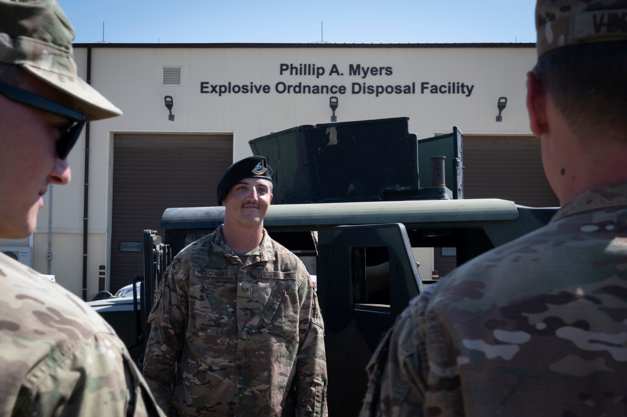 Airmen talking in a group