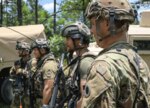 Cpl. Jacob East, right, a signal support system specialist radio operator with the 37th Infantry Brigade Combat Team, positions himself alongside the Hungarian Defence Forces during bilateral training in June 2021 at the Joint Readiness Training Center in Fort Polk, La. The HDF contingent joined the 37th IBCT, along with units from several other National Guard states, to train on large-scale combat operations on the battlefield.