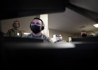 JOINT BASE LANGLEY-EUSTIS, Va. (Aug. 5, 2021) Army Spc. Edgar Torres, assigned to the 549th Military Intelligence Battalion, out of San Antonio, gives a predictive analysis on the path of a simulated hurricane while augmenting the J2 intelligence directorate at Joint Task Force Civil Support (JTF-CS) during a commander’s update brief as part of exercise Vibrant Response 21.2.