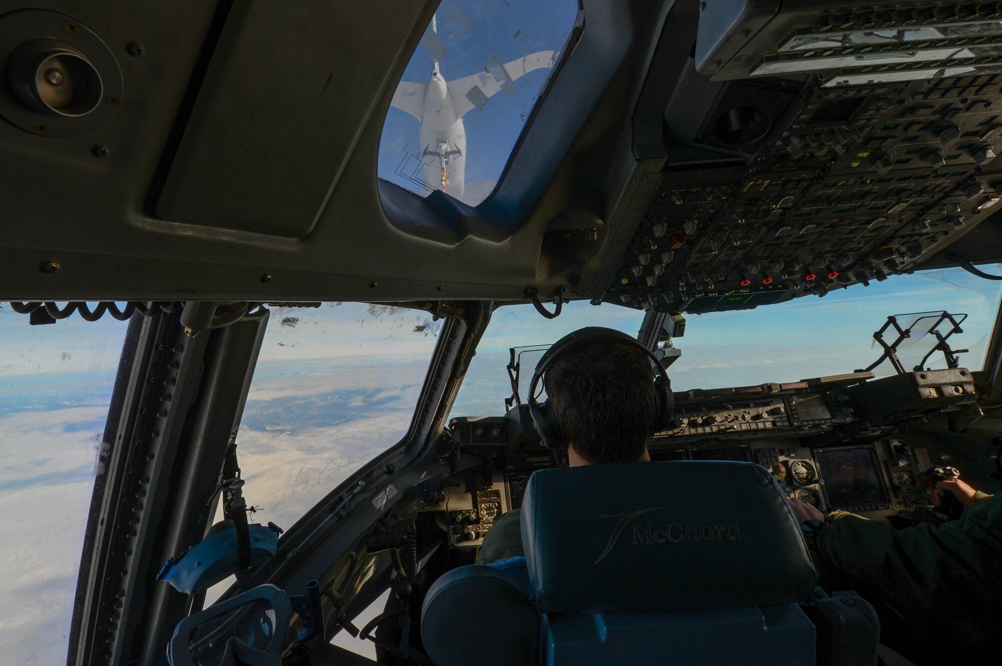 Capt. Wade Gallup, 7th Airlift Squadron pilot, approaches a KC-46 Pegasus during refueling training over central Wash., Jan. 30, 2019. With its multiple options the KC-46 can refuel Air Force, Navy, Marine Corps and partner nation aircraft. (U.S. Air Force photo by A1C Sara Hoerichs)